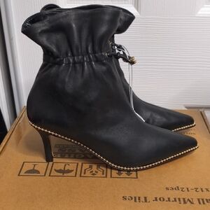 Coach Black Heeled Boots with Gold Trim